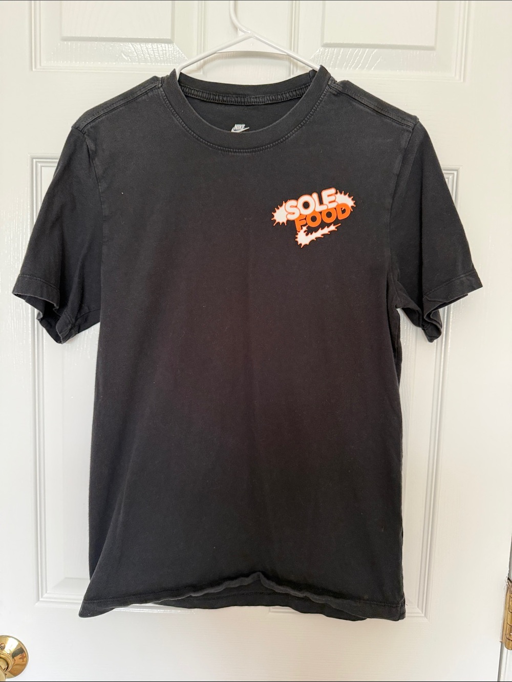 Nike Black Short-Sleeve Tee with Orange 'Sole Food' Logo